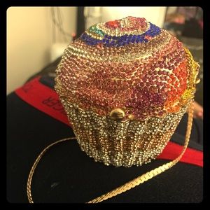 Rainbow color cupcake purse. Short gold chain.